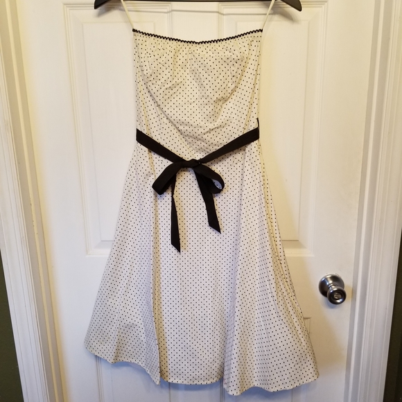 Ruby Rox Dresses & Skirts - Ruby Rox Ivory Polka Dot Dress with Black Sash